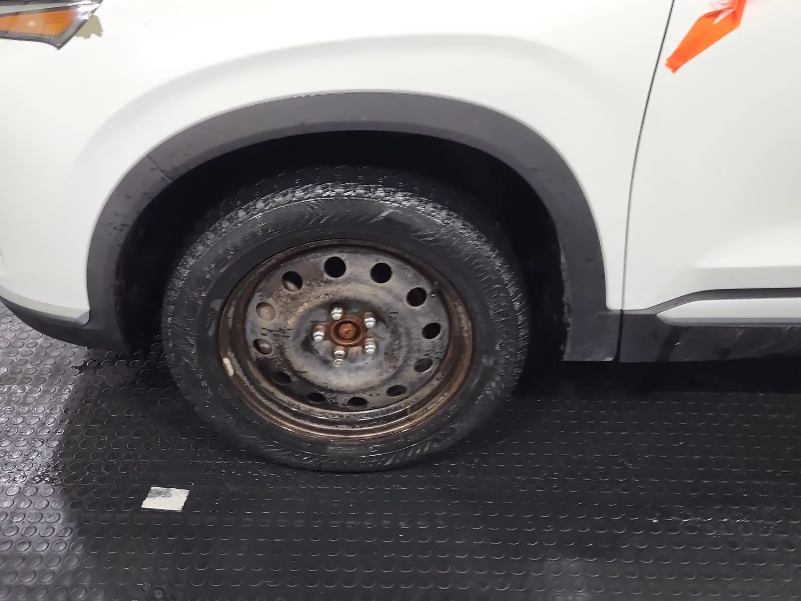 Front driver wheel/tire photo