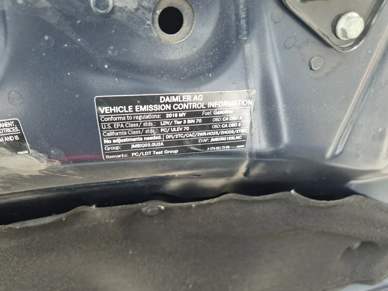 Emission Sticker Photo