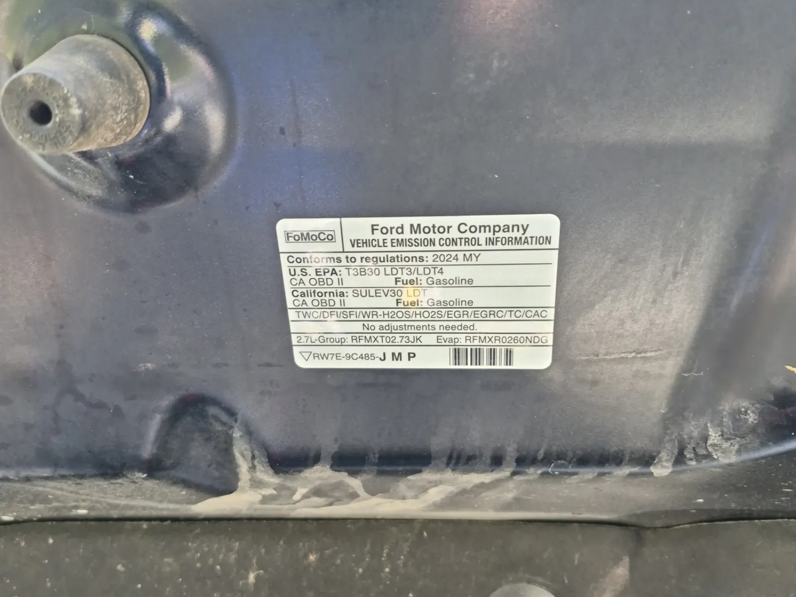 Emission Sticker Photo
