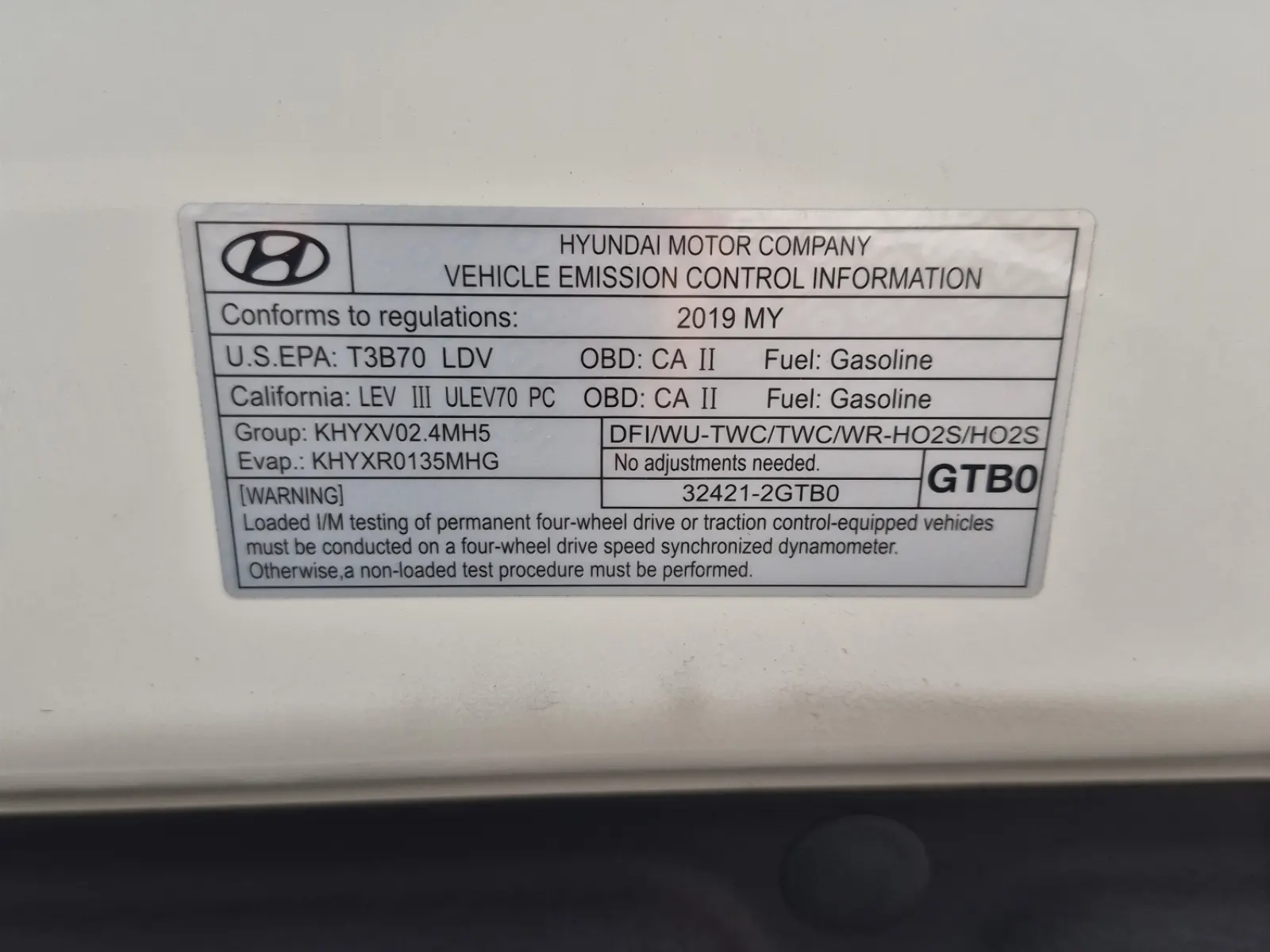 Emission Sticker Photo