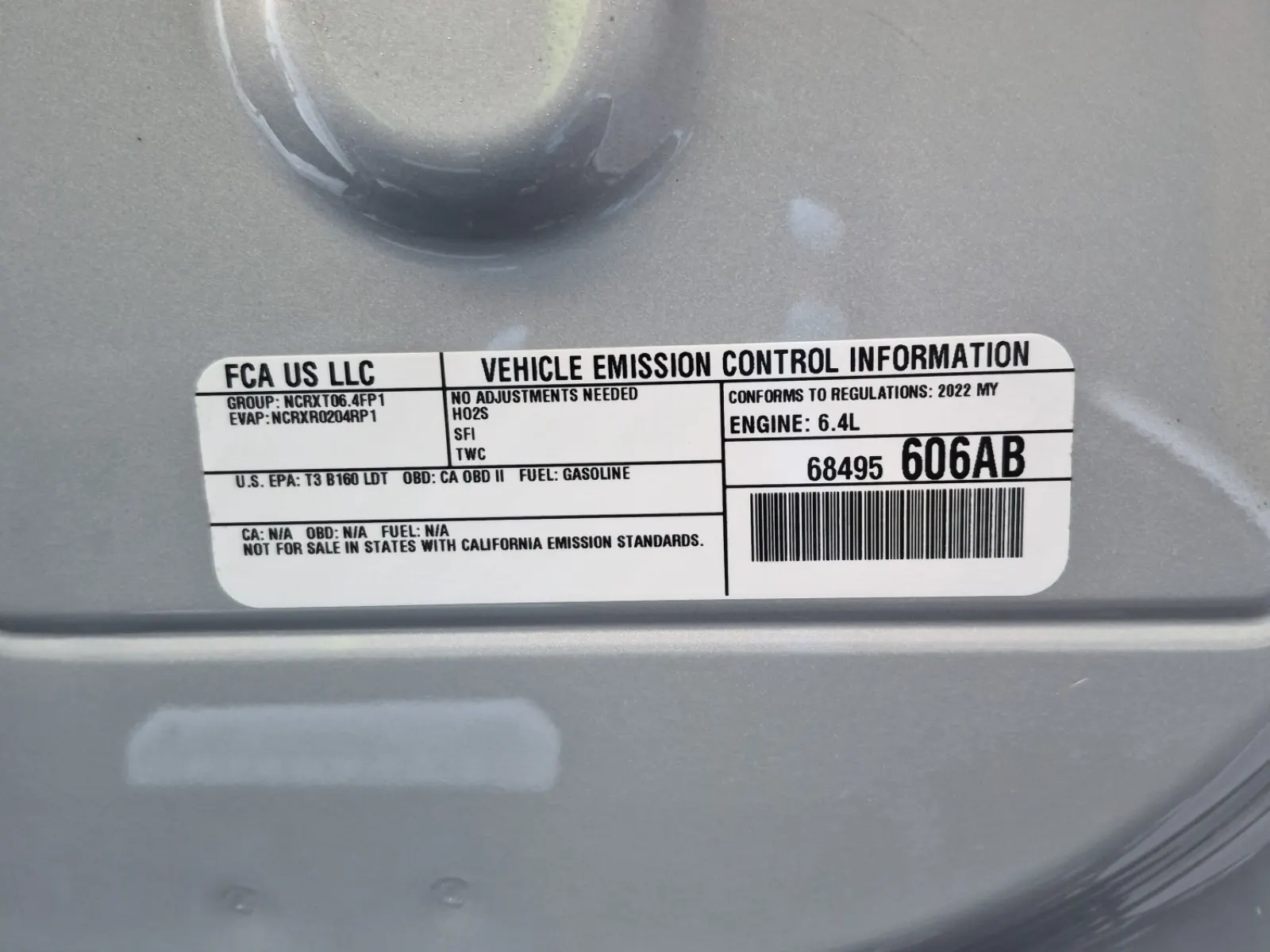 Emission Sticker Photo