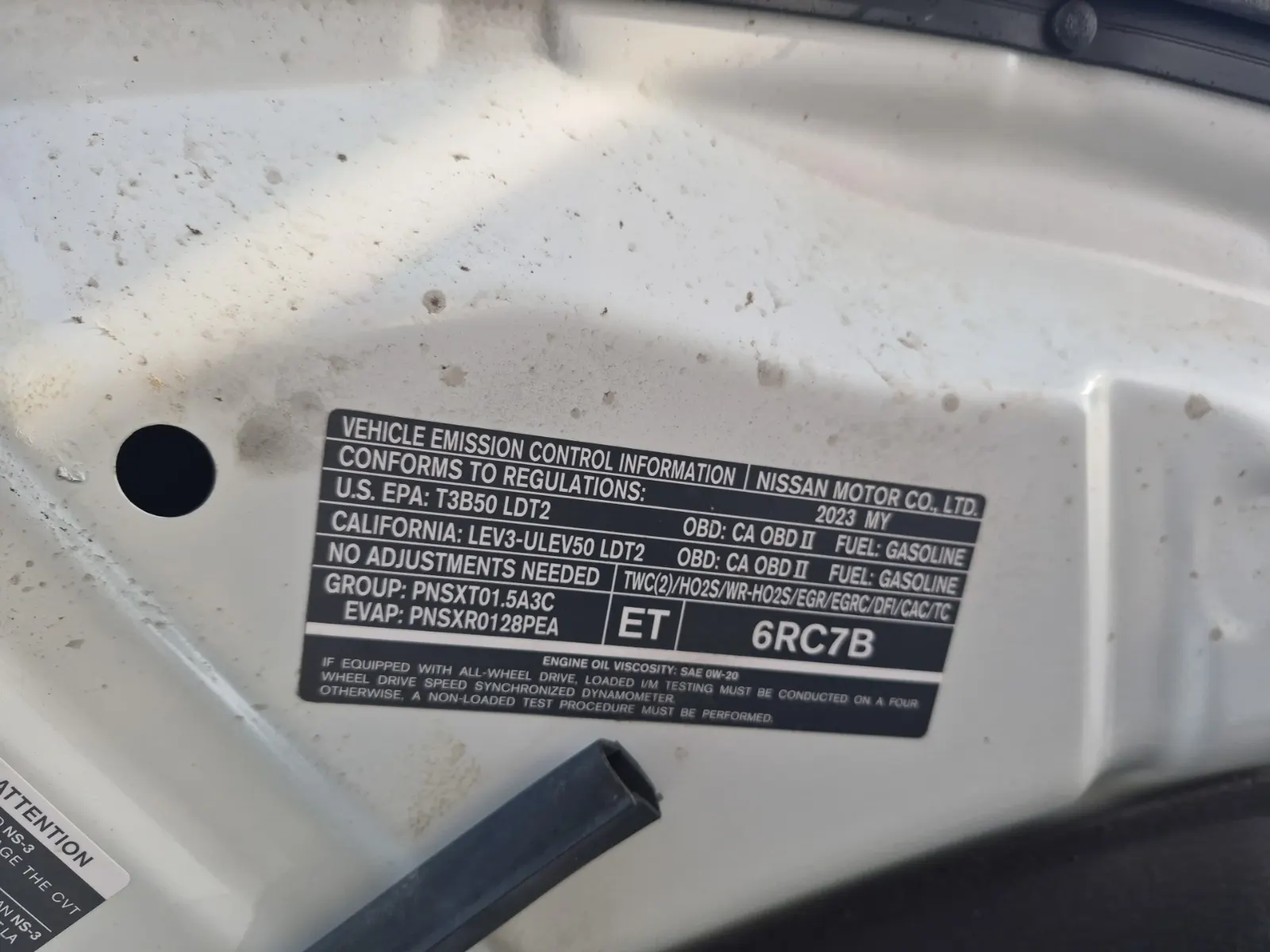 Emission Sticker Photo