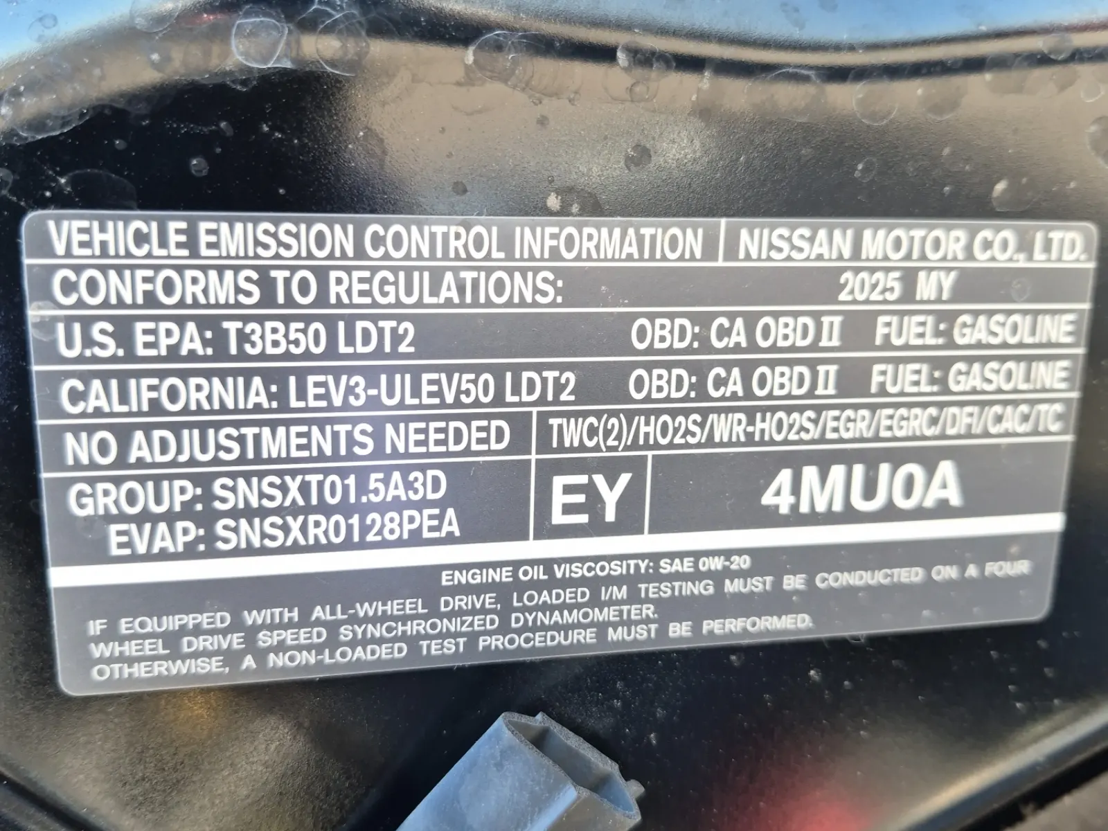 Emission Sticker Photo