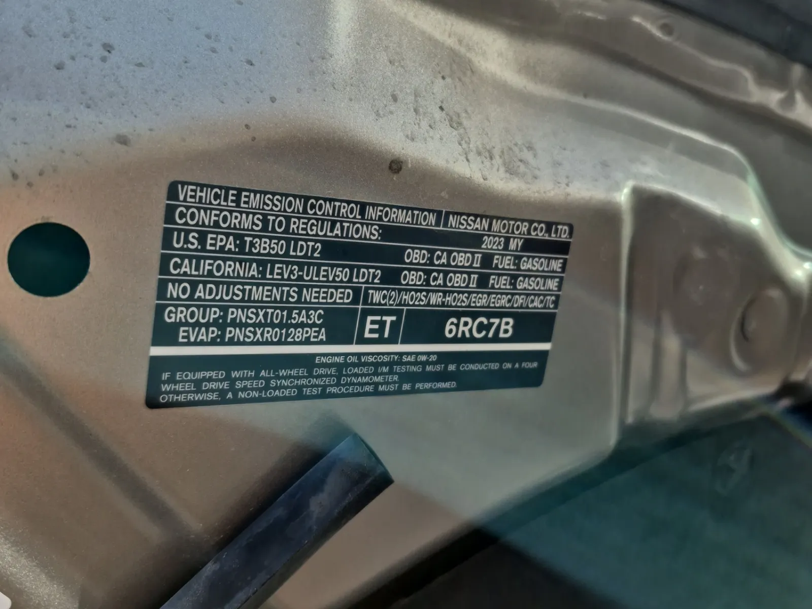 Emission Sticker Photo