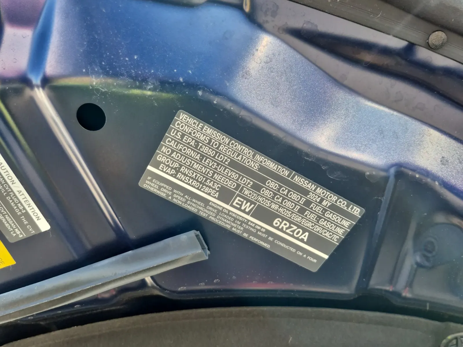 Emission Sticker Photo