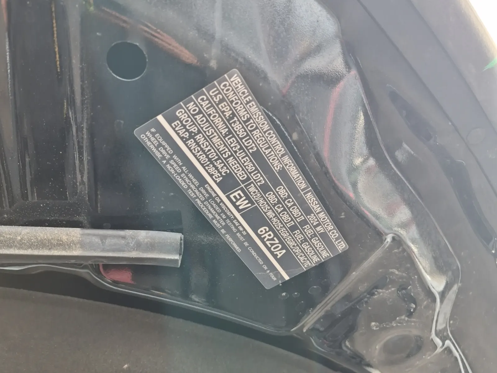 Emission Sticker Photo