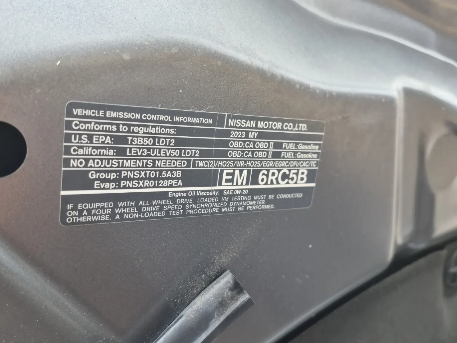 Emission Sticker Photo