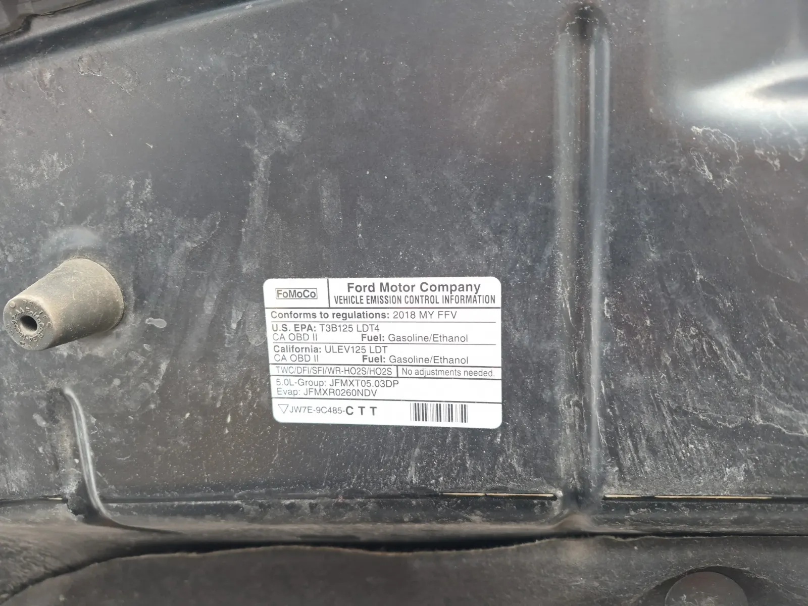 Emission Sticker Photo