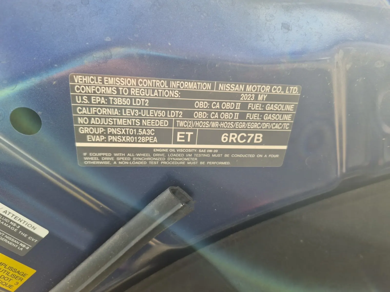 Emission Sticker Photo