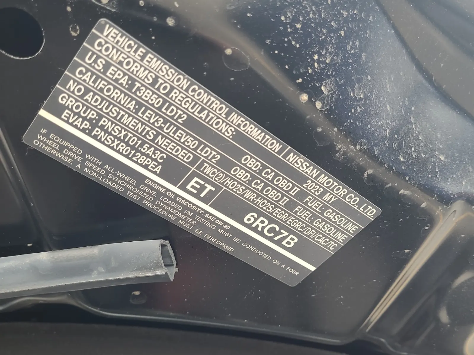 Emission Sticker Photo