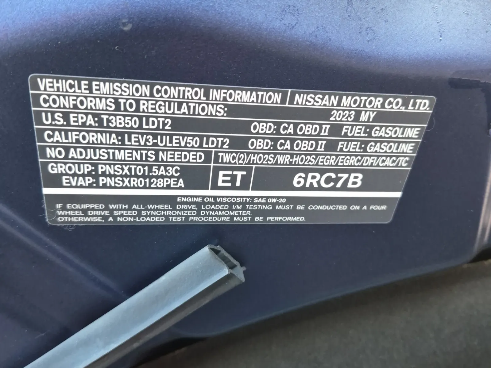 Emission Sticker Photo