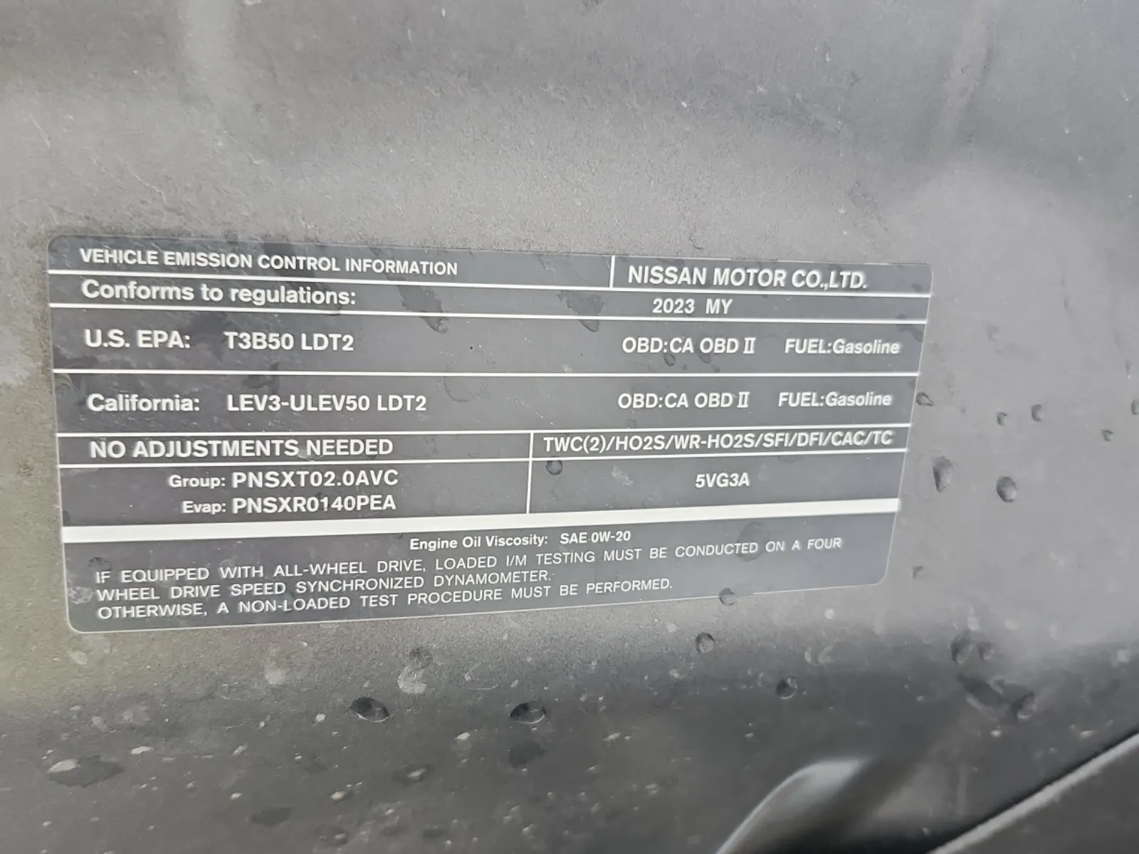 Emission Sticker Photo