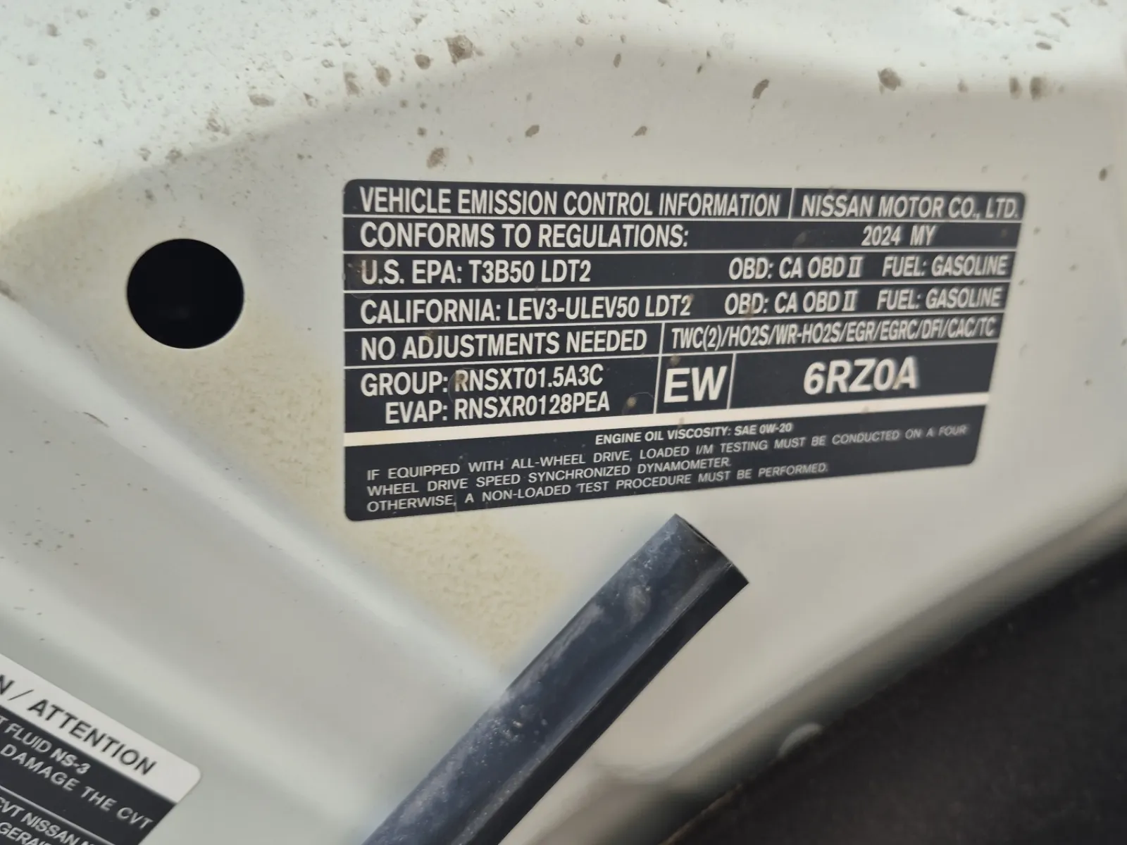 Emission Sticker Photo