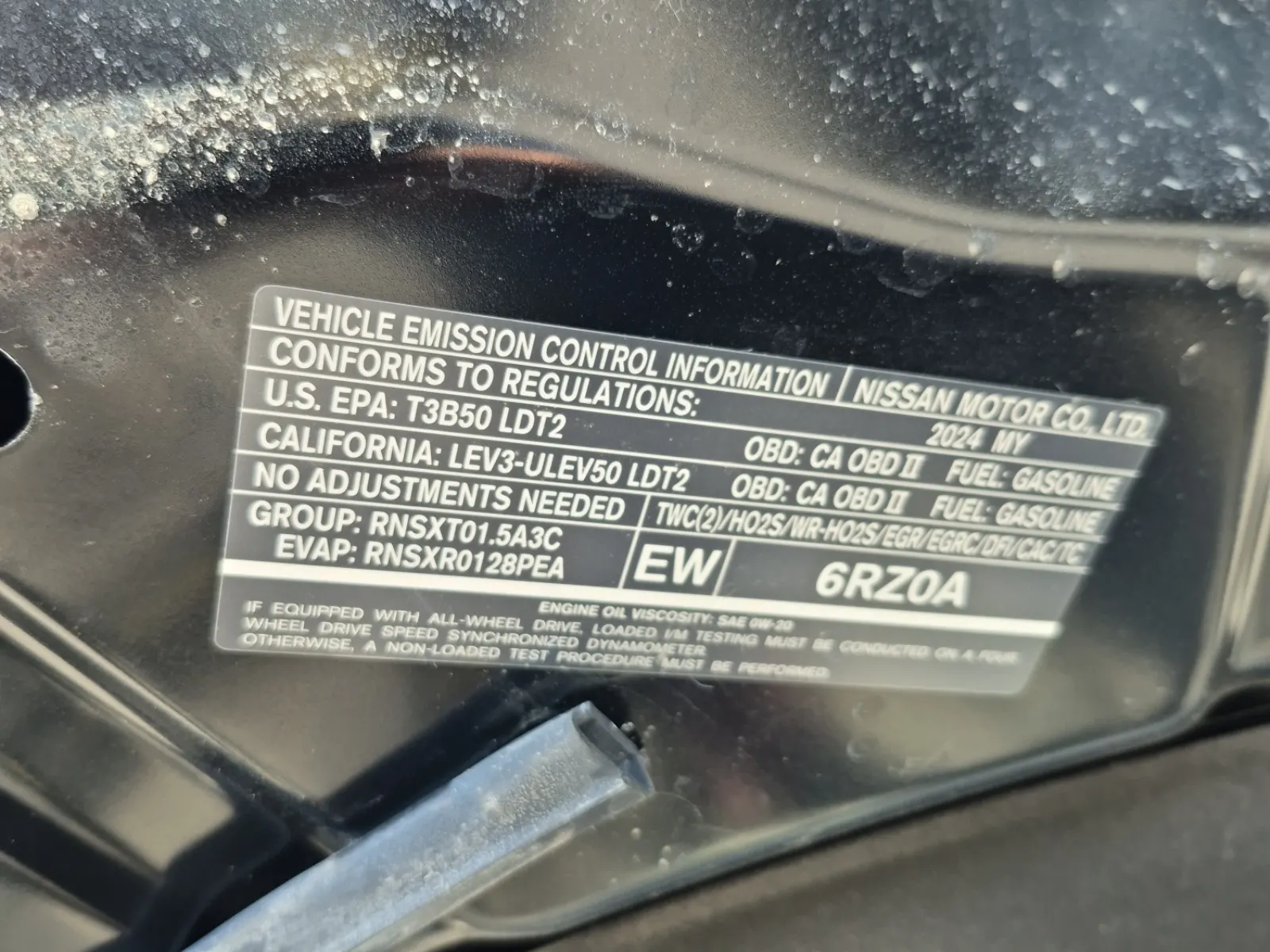 Emission Sticker Photo
