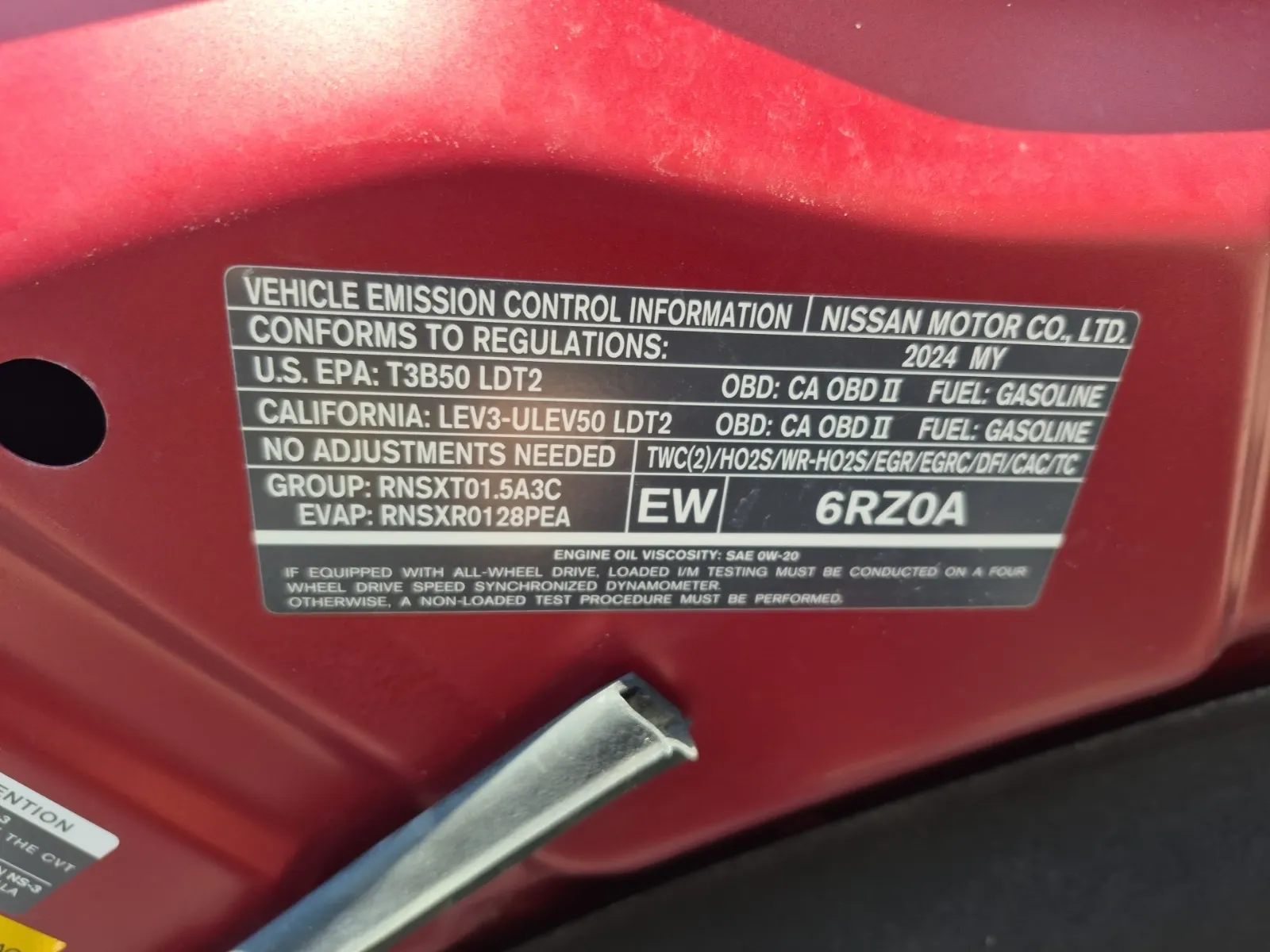 Emission Sticker Photo