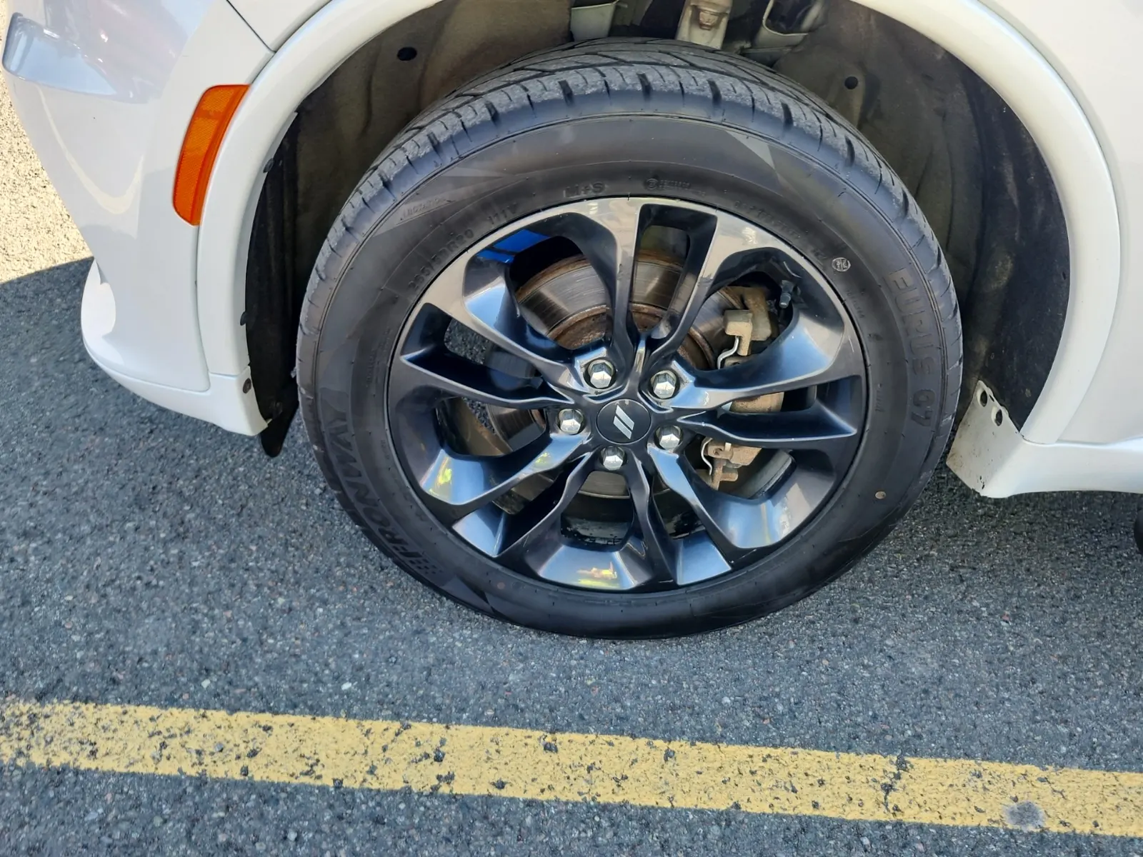 Front driver wheel/tire photo