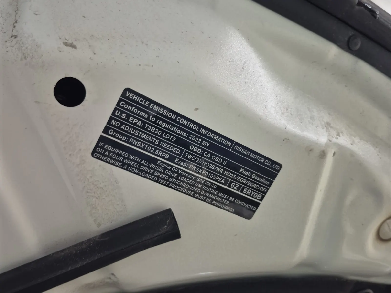 Emission Sticker Photo