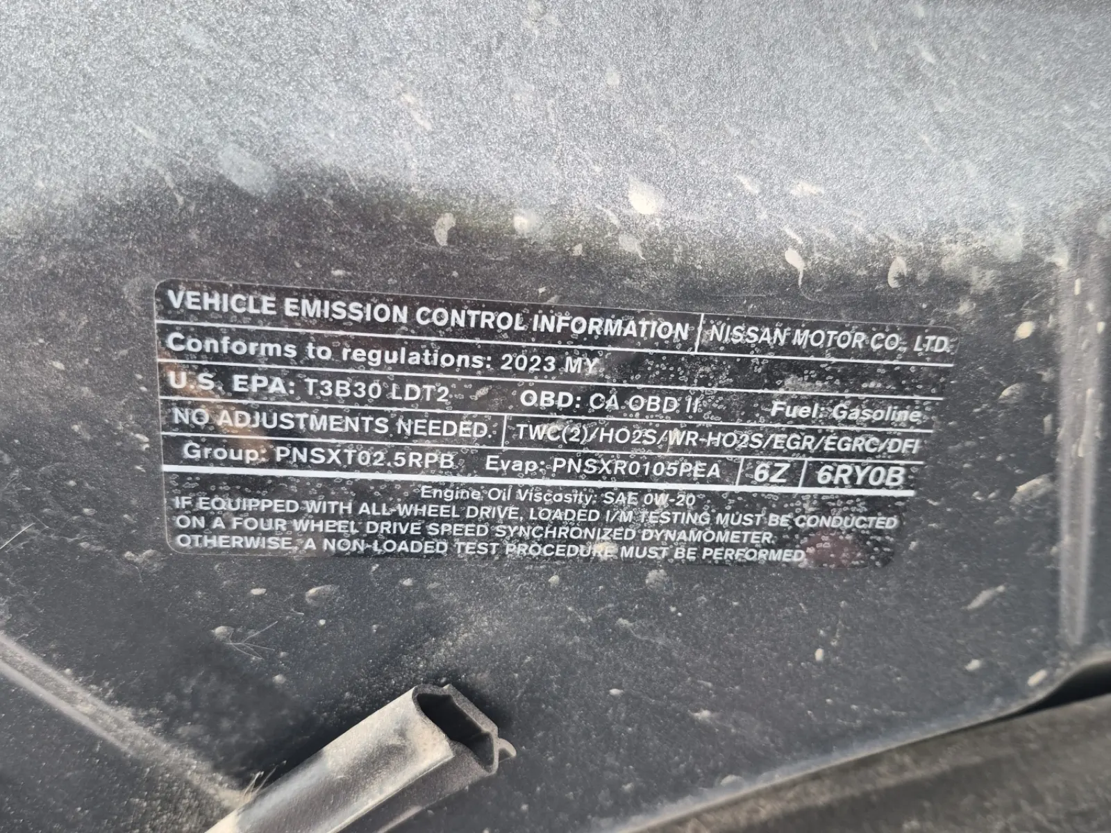 Emission Sticker Photo