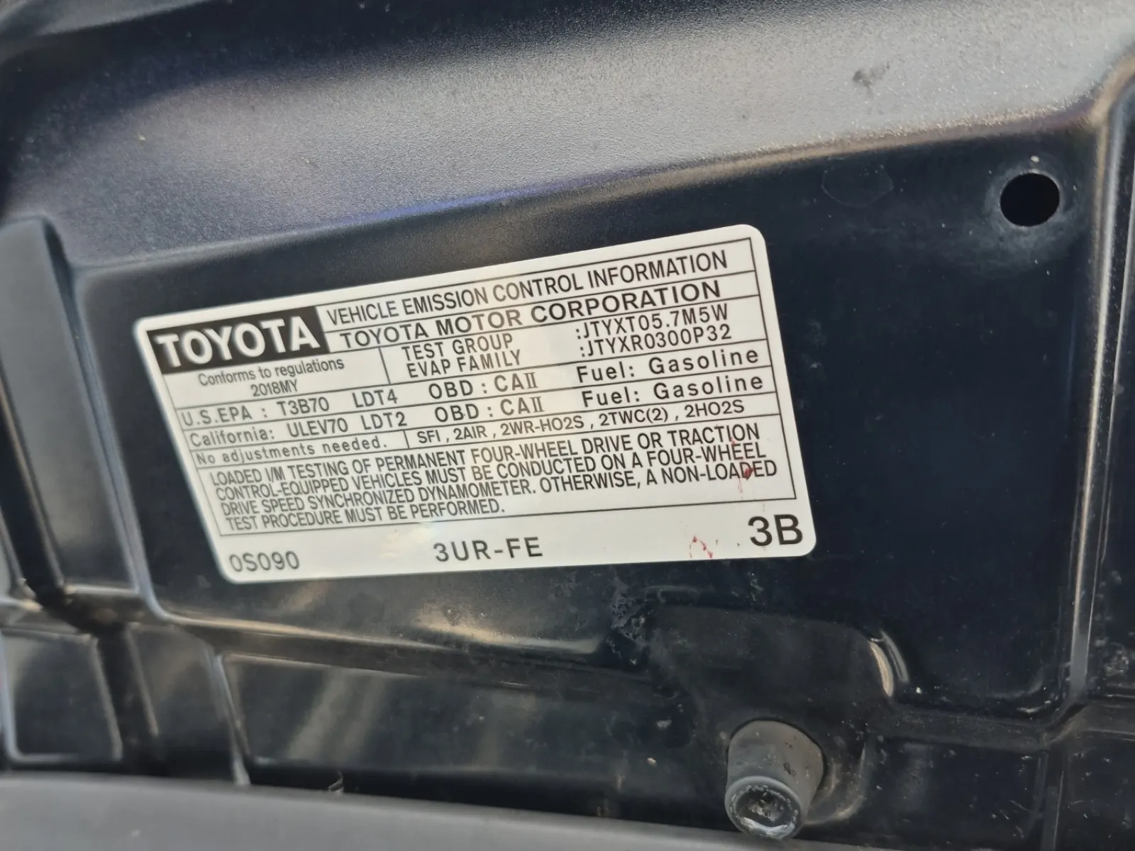 Emission Sticker Photo