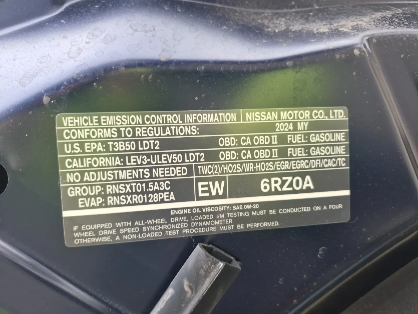 Emission Sticker Photo