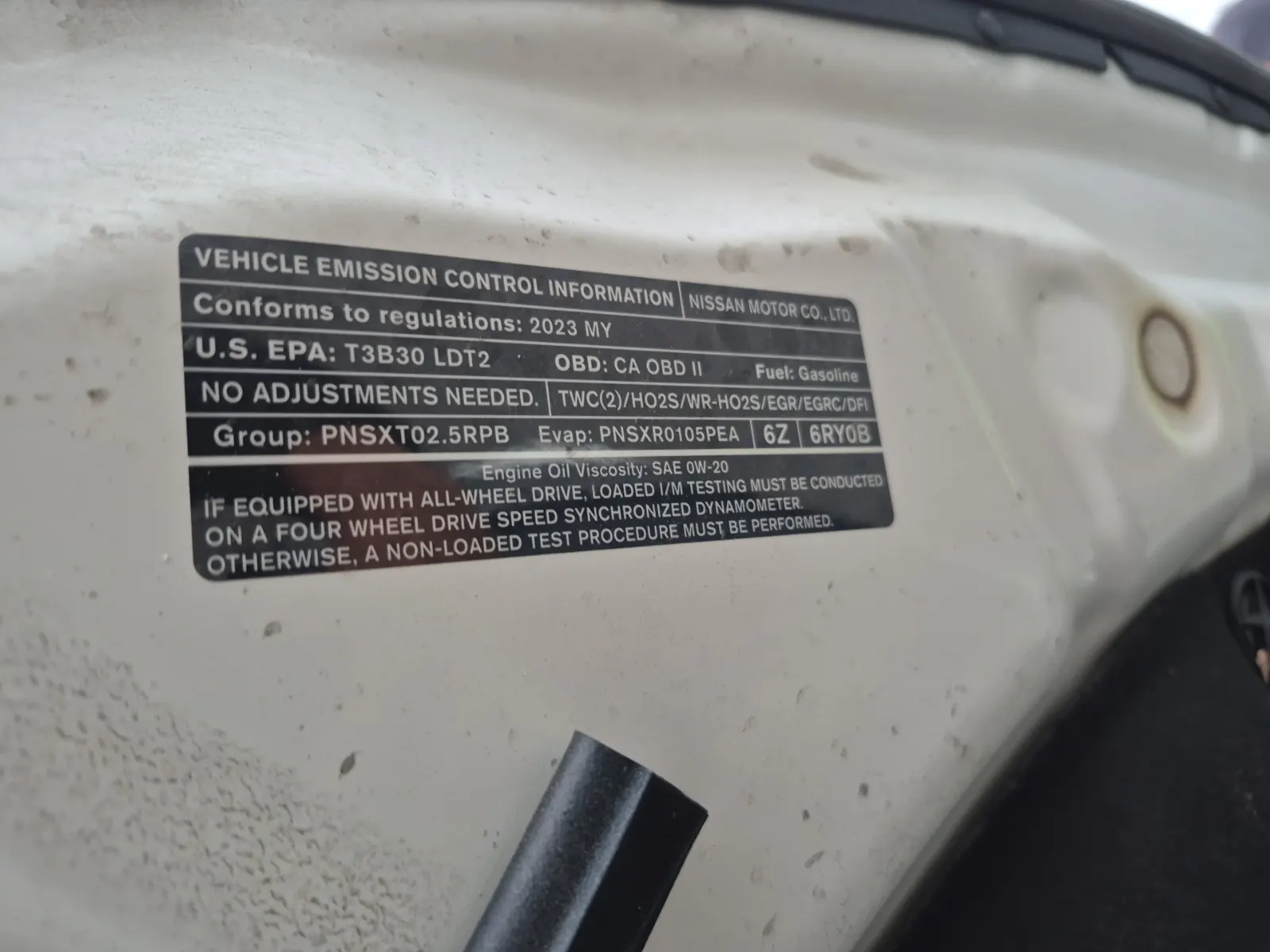 Emission Sticker Photo
