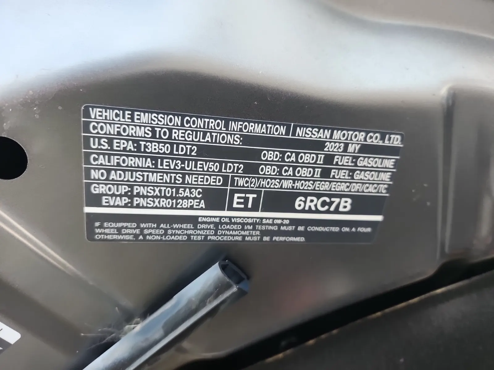 Emission Sticker Photo