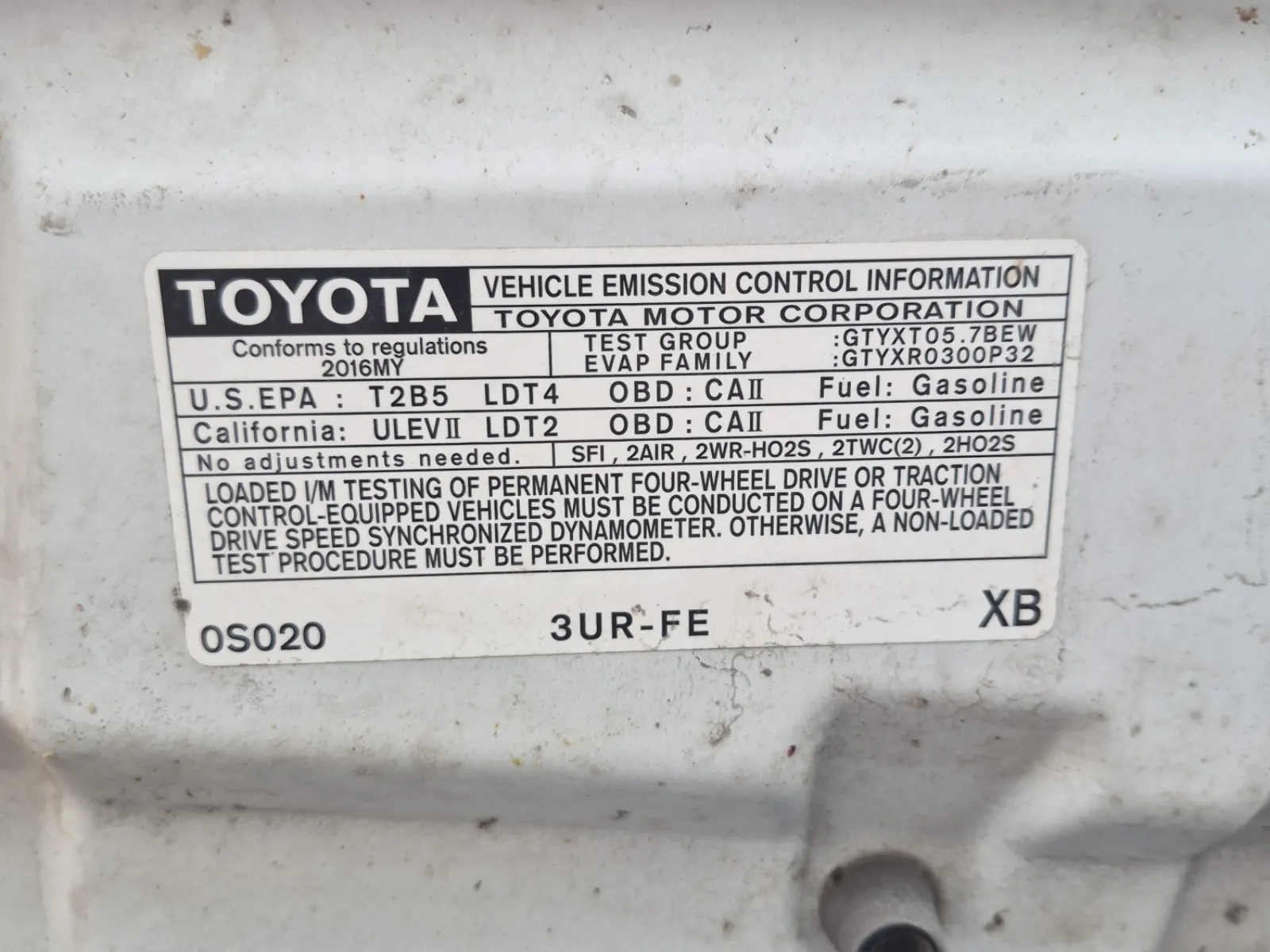 Emission Sticker Photo