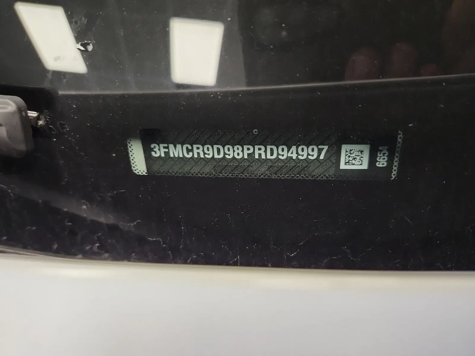 Dash VIN Plate Photo