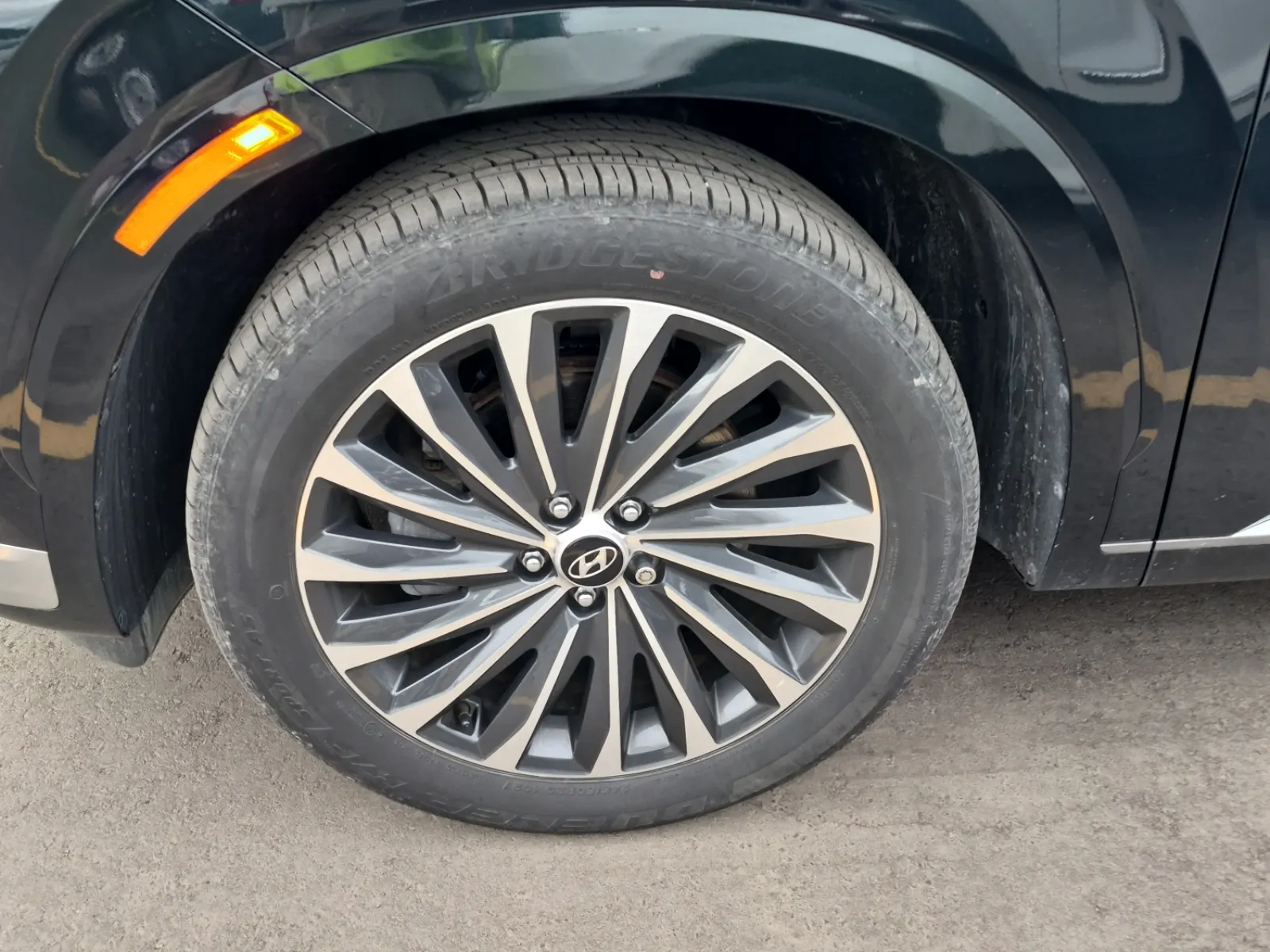 Front driver wheel/tire photo