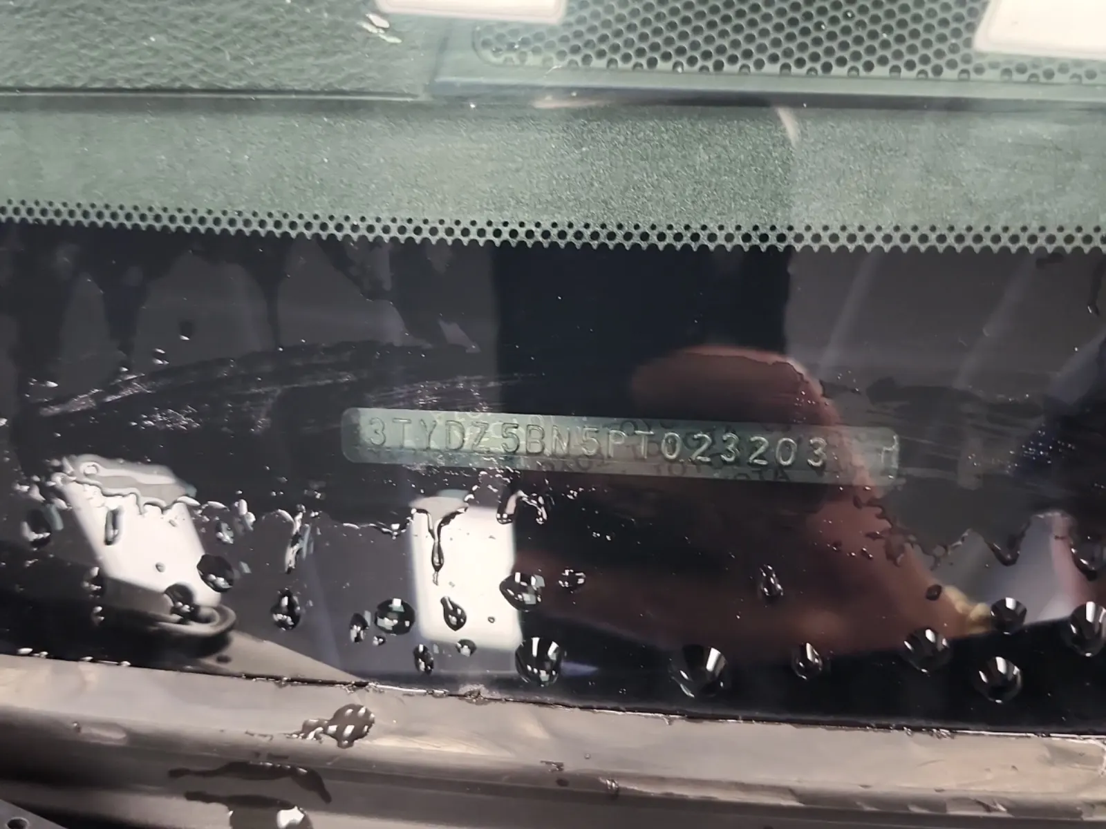 Dash VIN Plate Photo