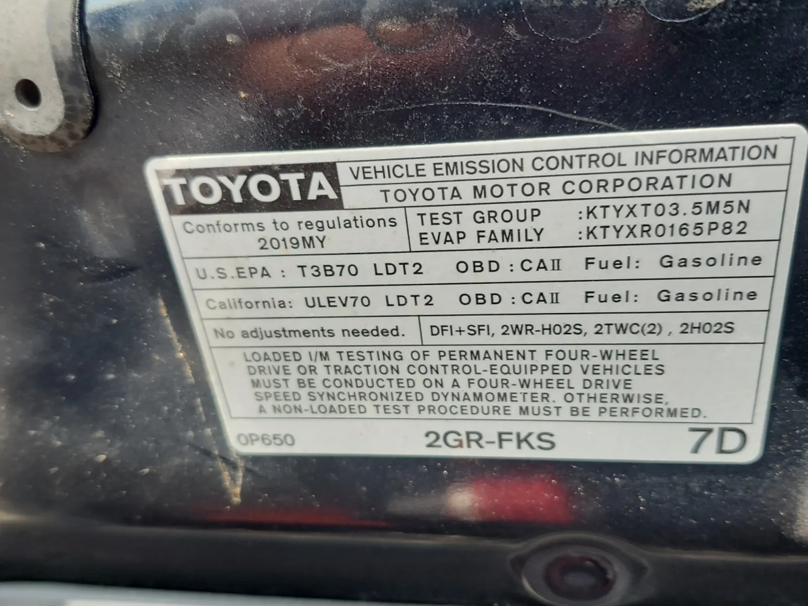 Emission Sticker Photo