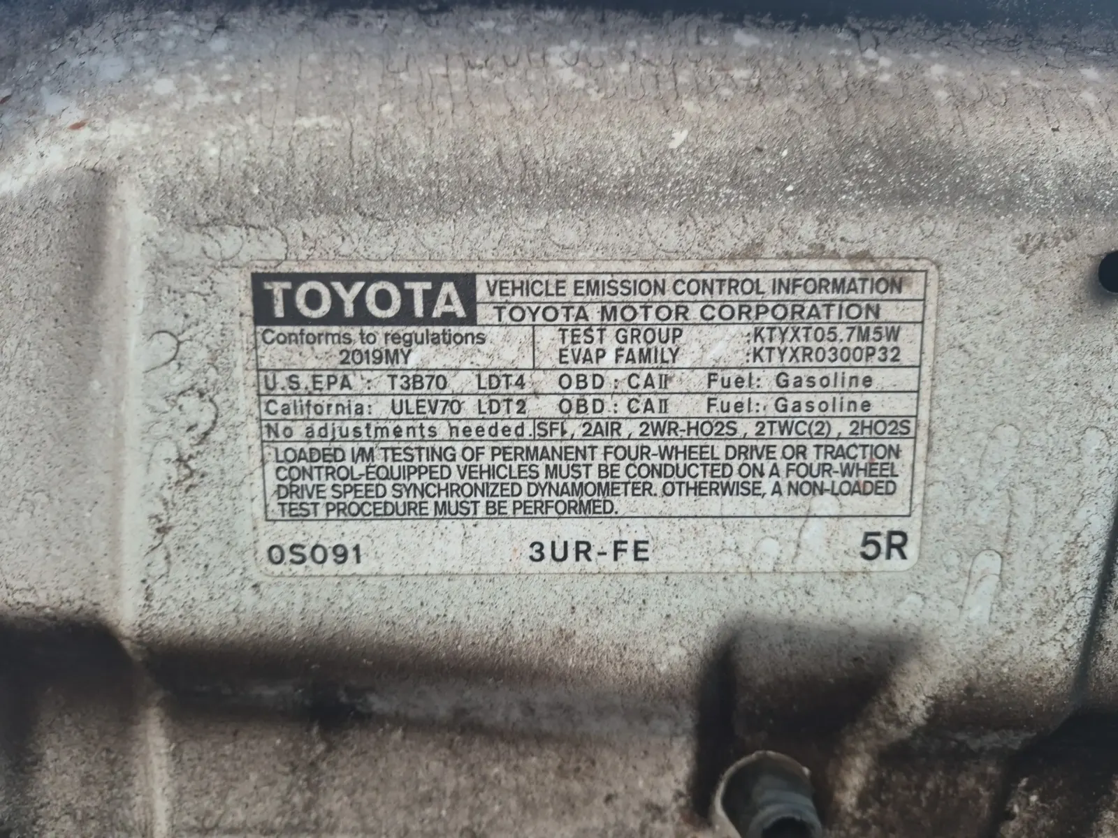 Emission Sticker Photo