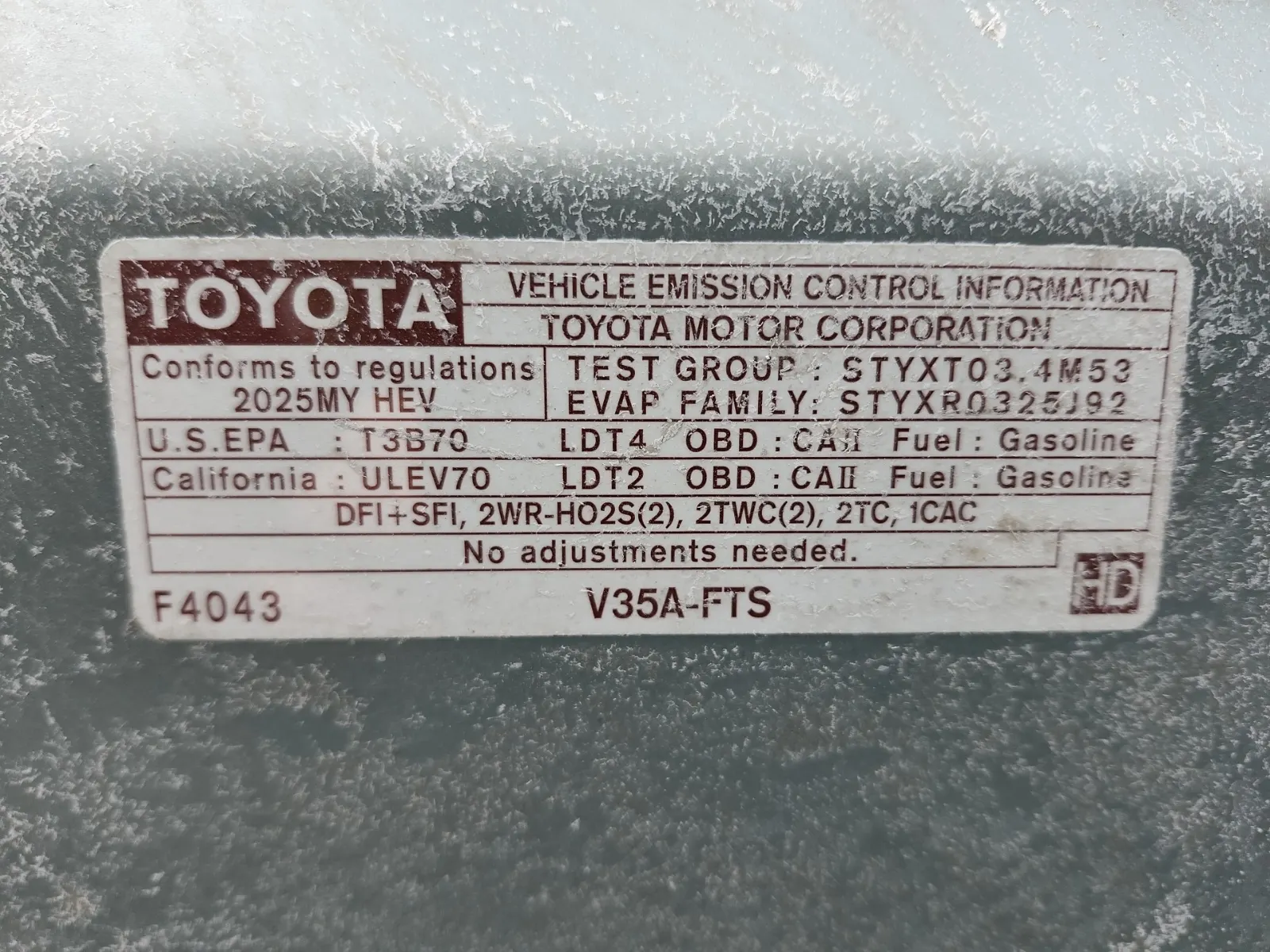 Emission Sticker Photo