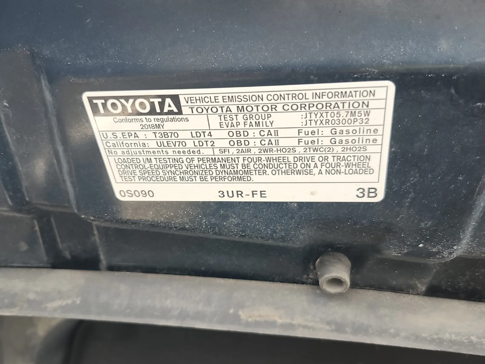Emission Sticker Photo