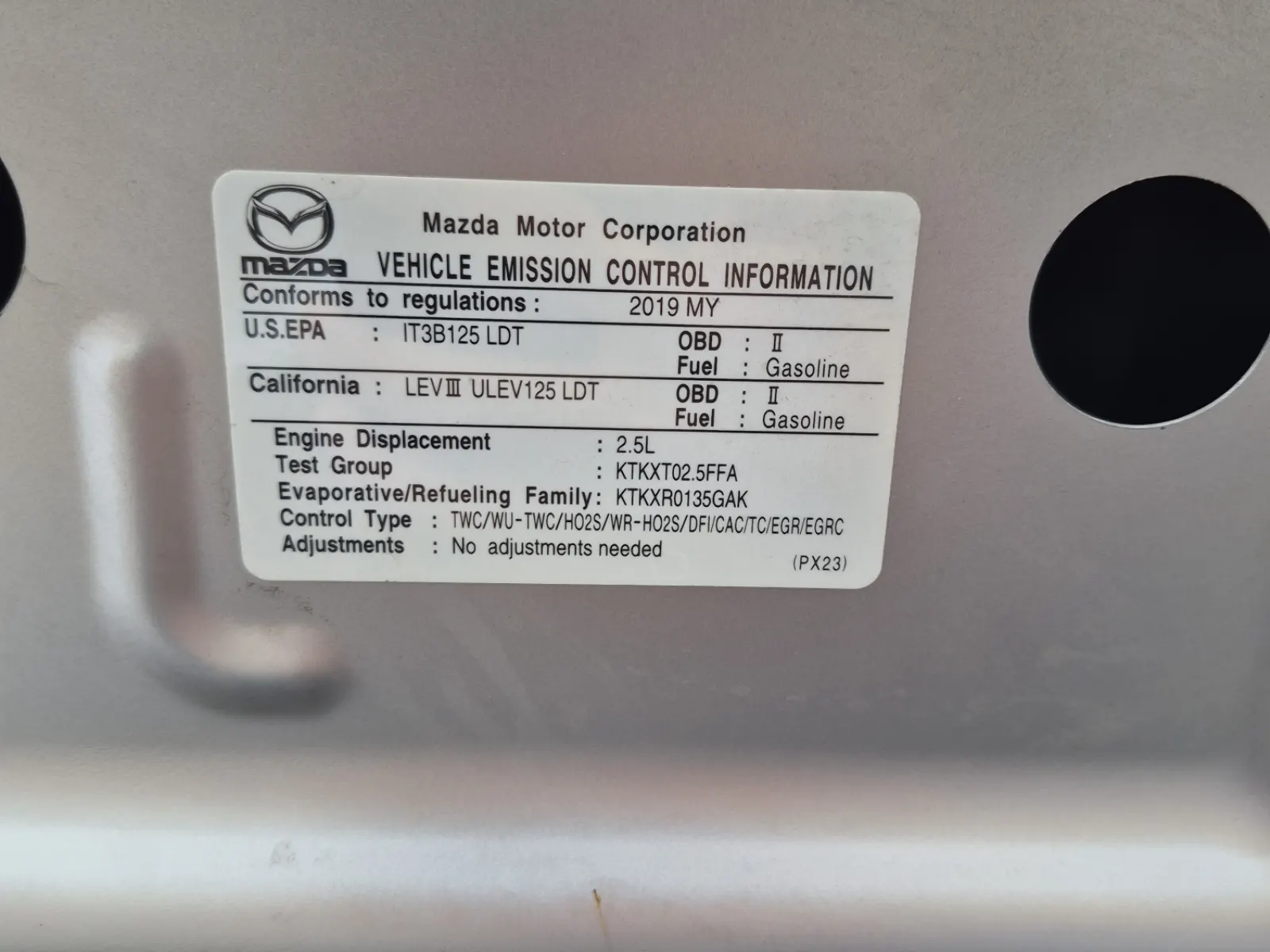 Emission Sticker Photo
