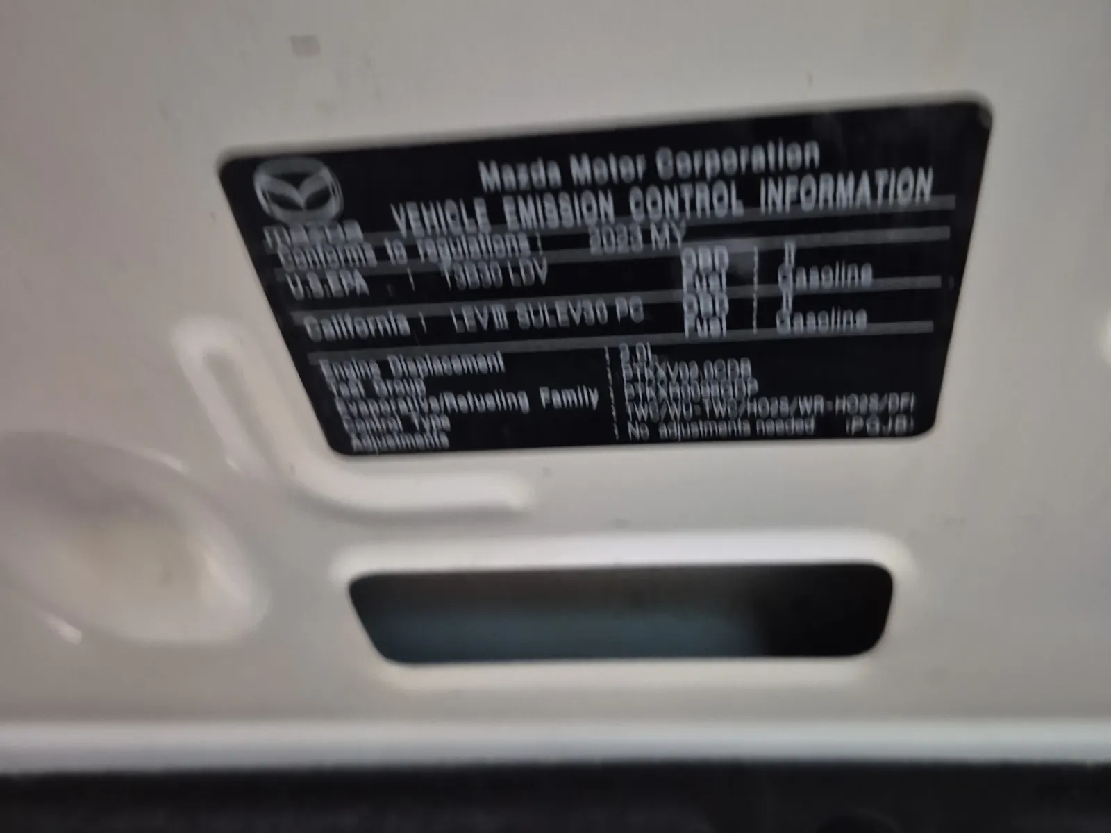 Emission Sticker Photo