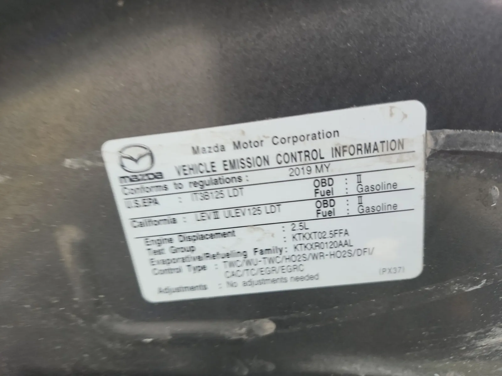 Emission Sticker Photo