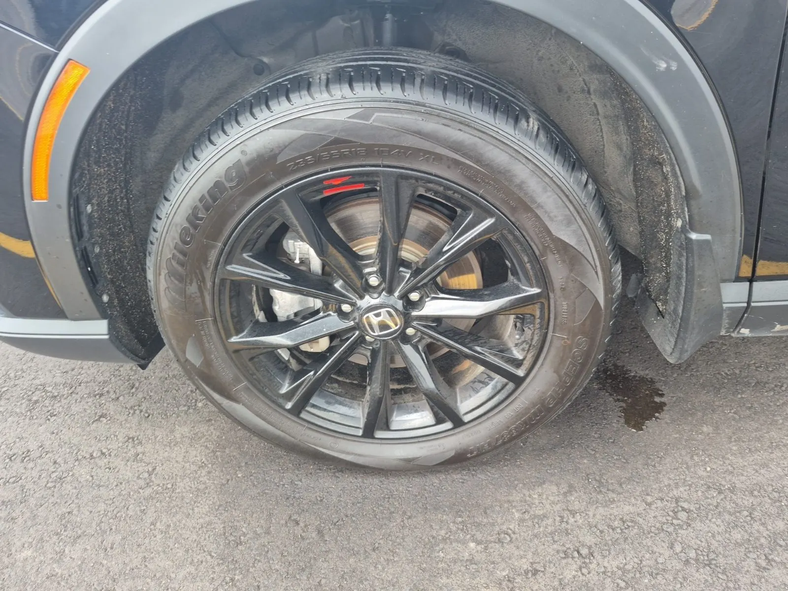 Front driver wheel/tire photo