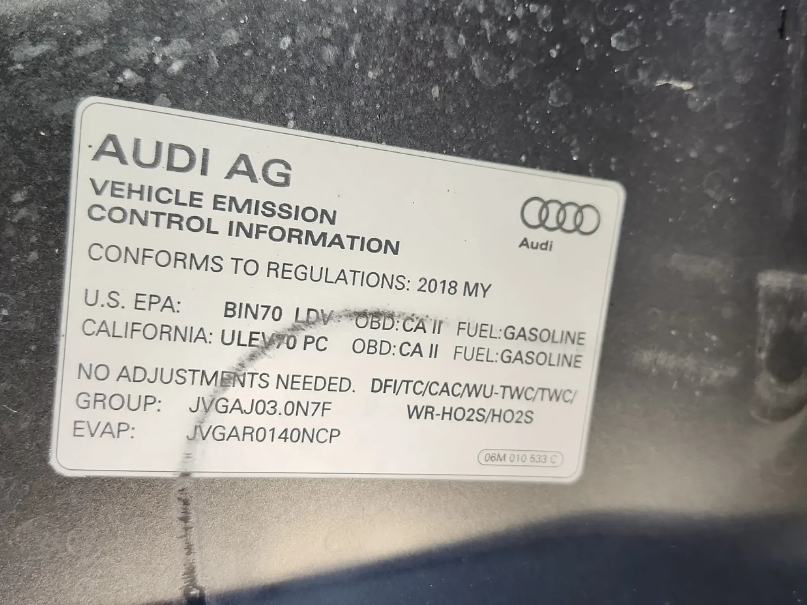 Emission Sticker Photo