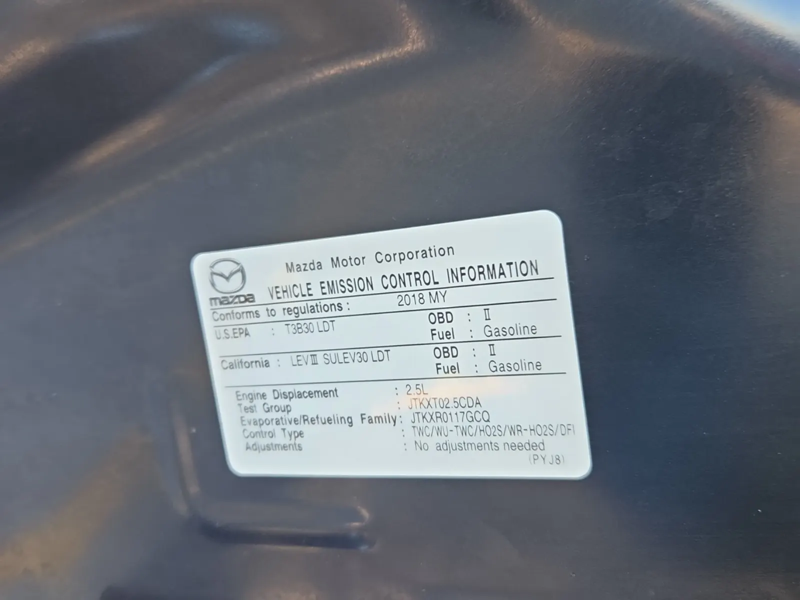 Emission Sticker Photo
