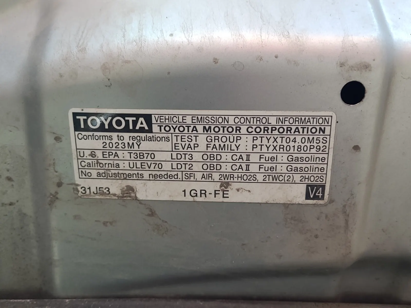 Emission Sticker Photo