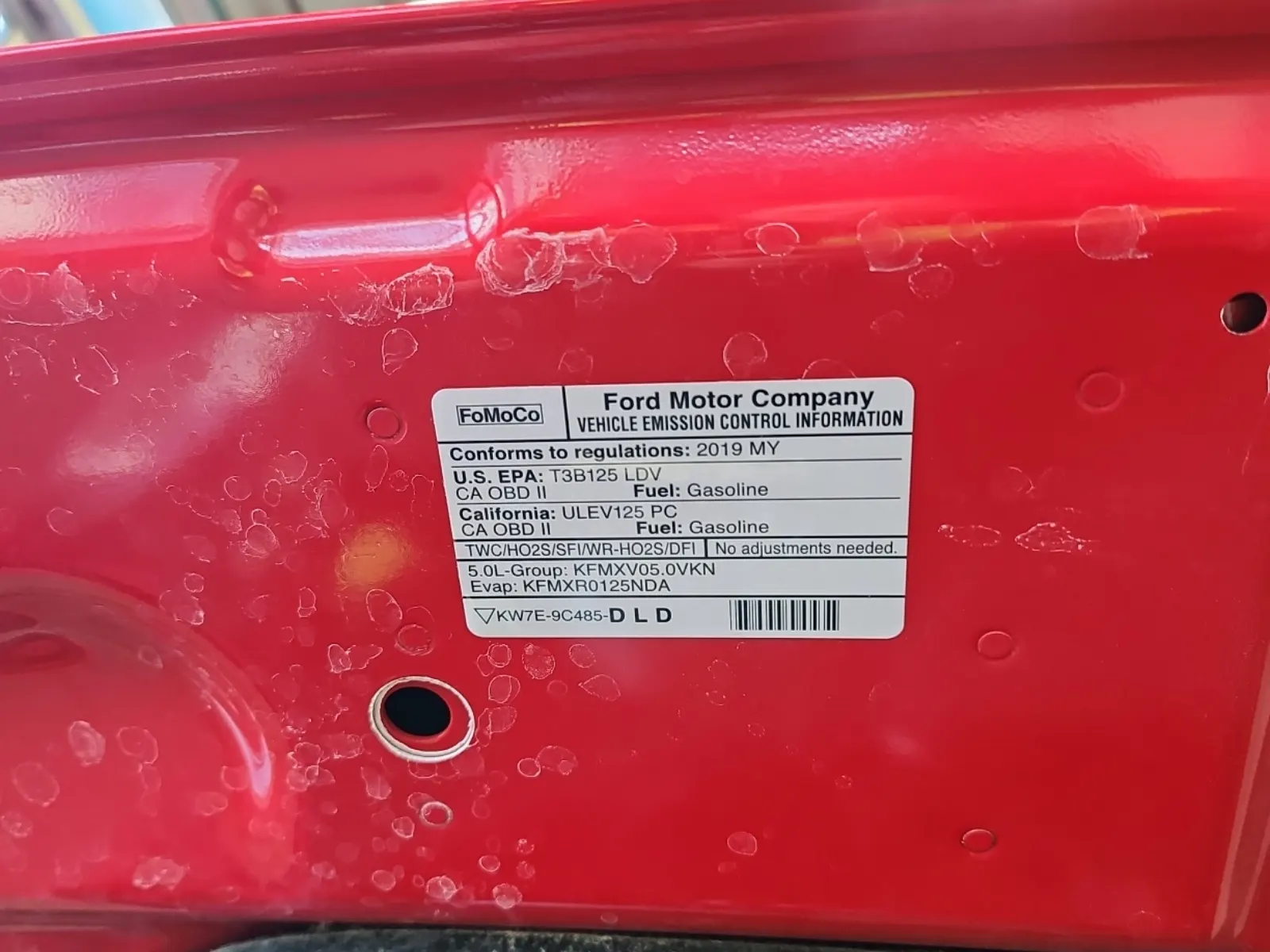 Emission Sticker Photo